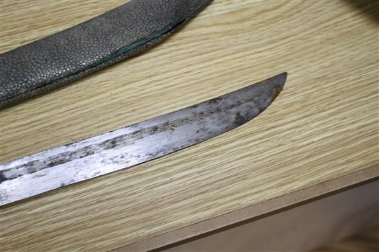 A 19th century Chinese sword, with shagreen and bronze mounted scabbard, the mounts slightly loose, with a fullered steel blade,